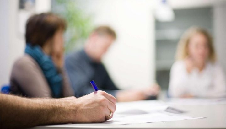 Website design meeting Photograph showing a website design process meeting