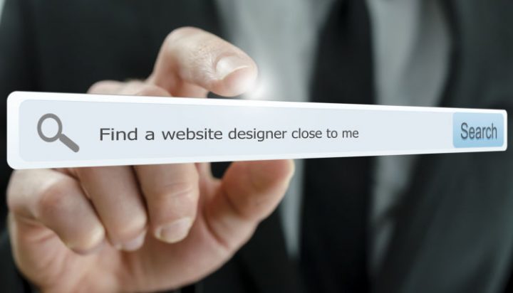 Find a website designer Photograph with a search field containing the search terms 'find a website designer close to me'